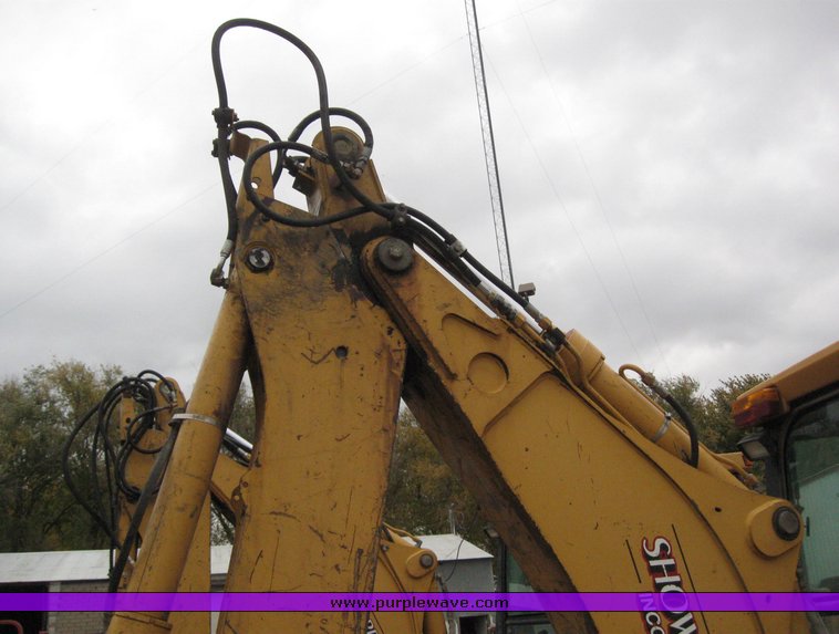 image for item 3911 1999 John Deere 310SE loader backhoe