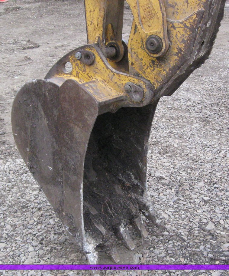 image for item 3911 1999 John Deere 310SE loader backhoe