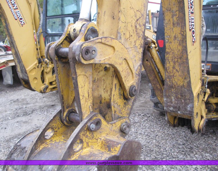 image for item 3911 1999 John Deere 310SE loader backhoe