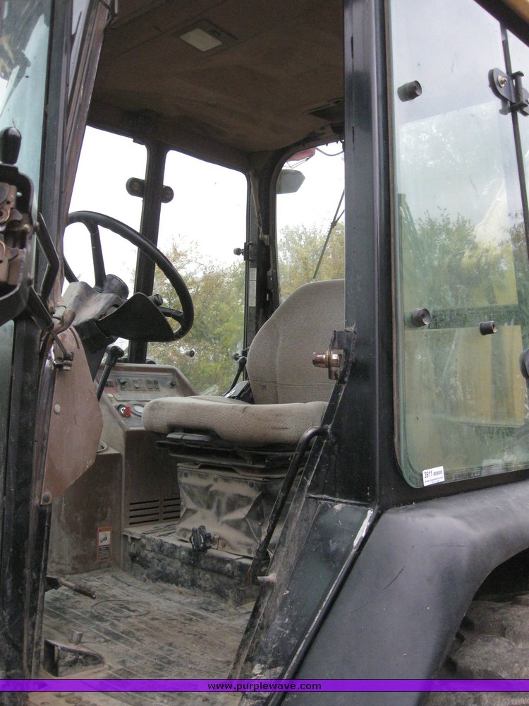 image for item 3911 1999 John Deere 310SE loader backhoe