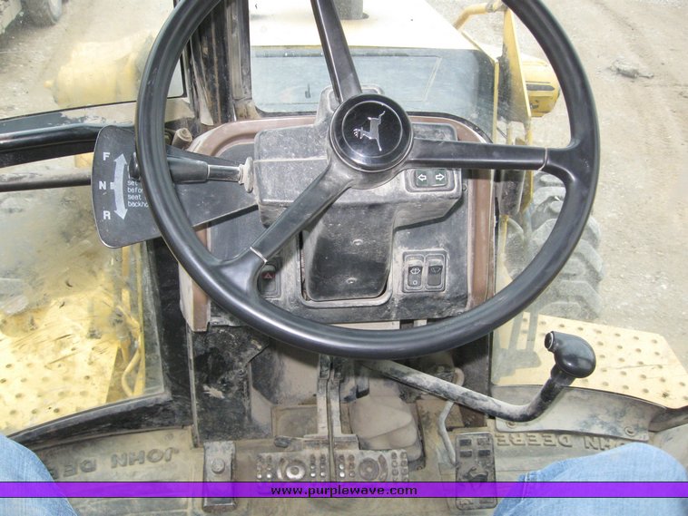 image for item 3911 1999 John Deere 310SE loader backhoe