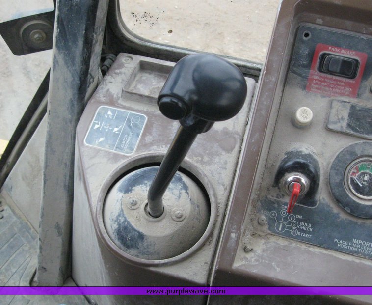 image for item 3911 1999 John Deere 310SE loader backhoe