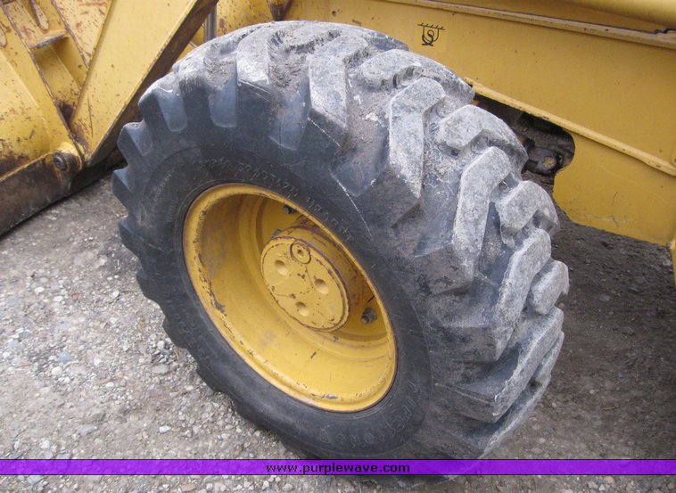 image for item 3911 1999 John Deere 310SE loader backhoe