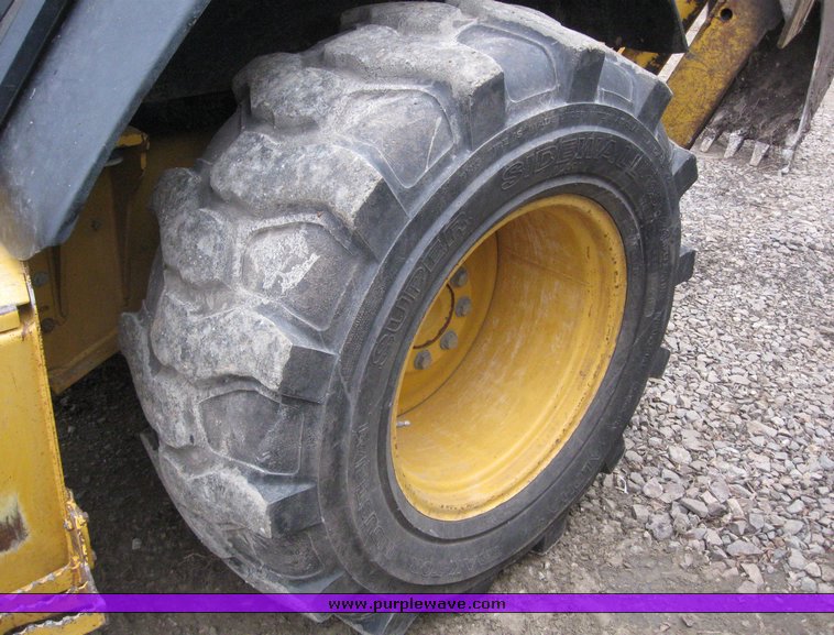 image for item 3911 1999 John Deere 310SE loader backhoe