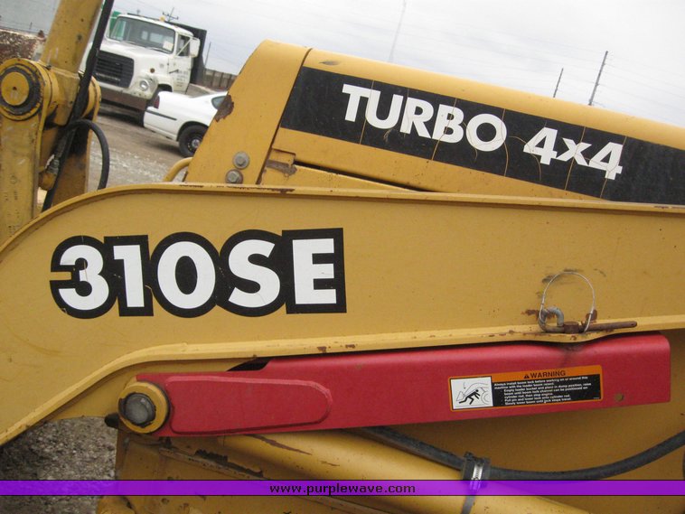 image for item 3911 1999 John Deere 310SE loader backhoe