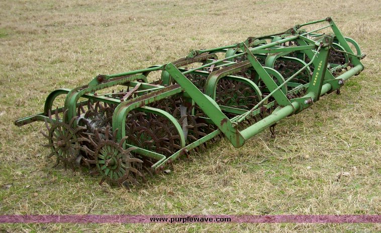 image for item 4077 John Deere 14' rotary hoe