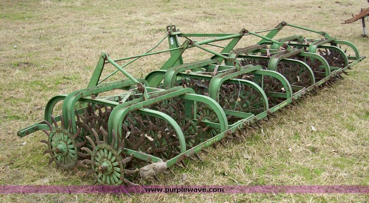 image for item 4077 John Deere 14' rotary hoe