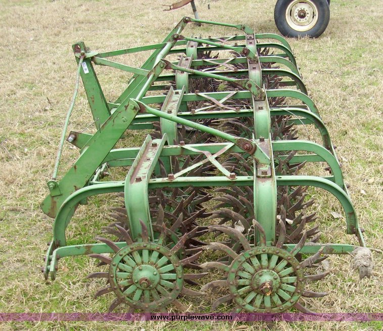 image for item 4077 John Deere 14' rotary hoe