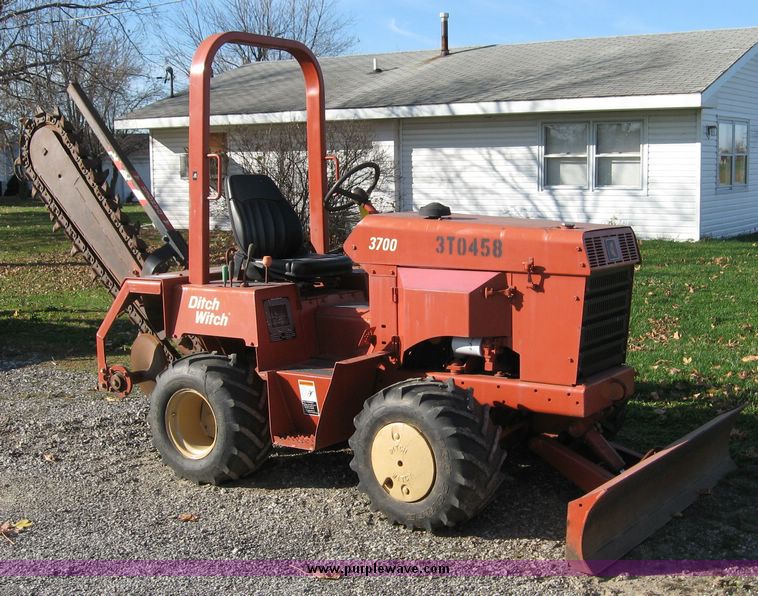 image for item 6565 2002 Ditch Witch 3700 trencher with front blade