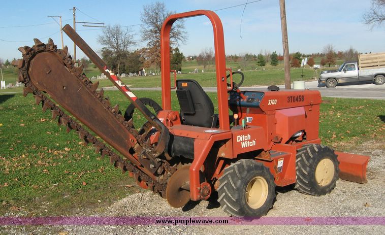 image for item 6565 2002 Ditch Witch 3700 trencher with front blade