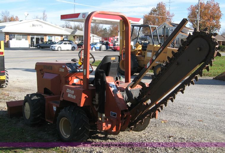 image for item 6565 2002 Ditch Witch 3700 trencher with front blade