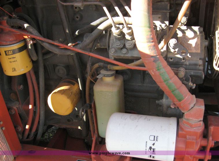 image for item 6565 2002 Ditch Witch 3700 trencher with front blade