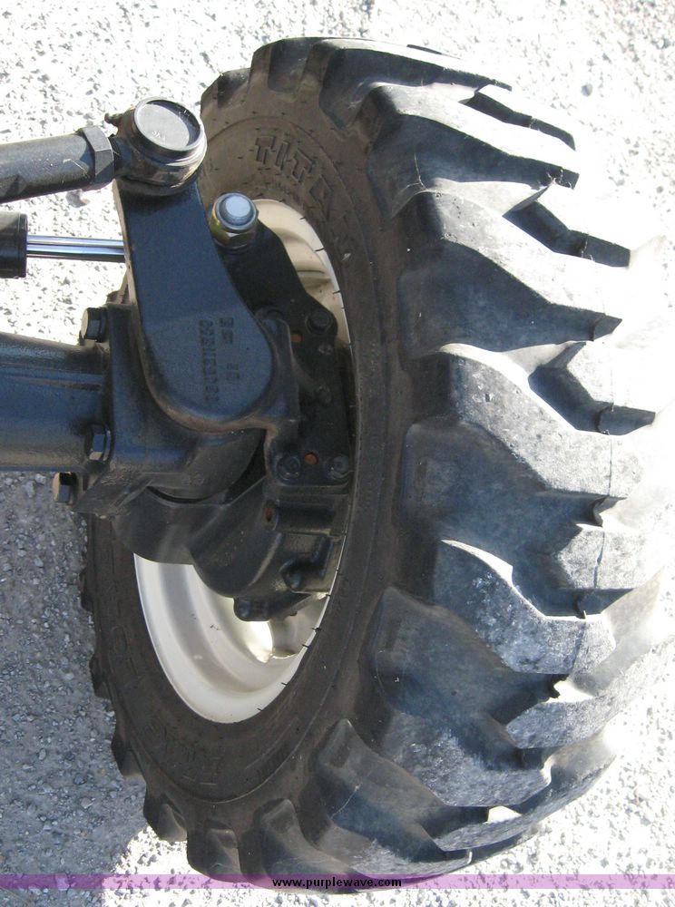 image for item 6566 2005 New Holland TC33DA MFWD tractor