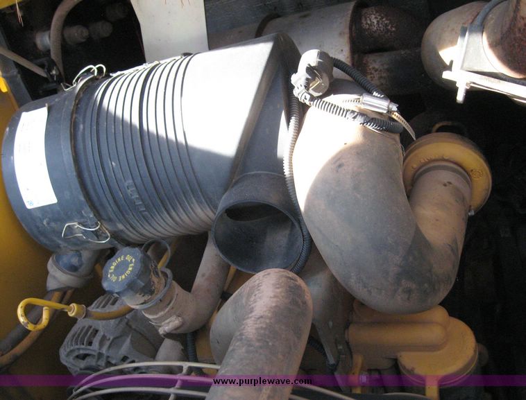 image for item 6567 2006 John Deere 325 skid steer