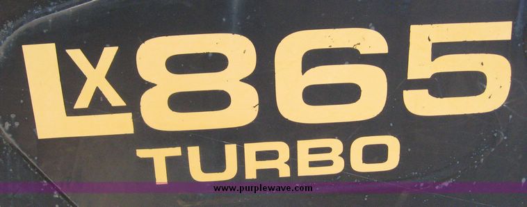 image for item 6602 1999 New Holland LX865 skid steer