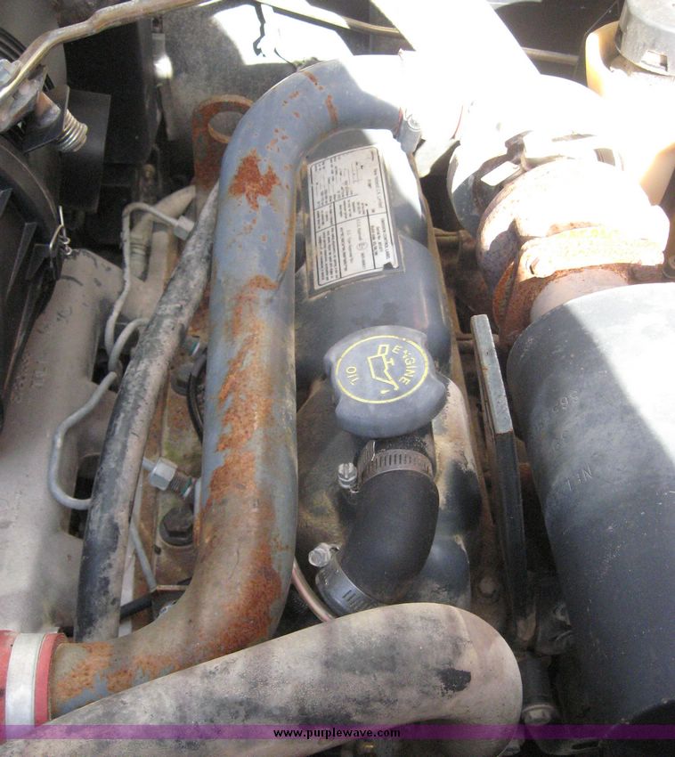 image for item 6602 1999 New Holland LX865 skid steer