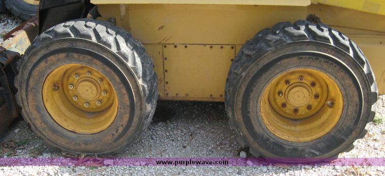 image for item 6602 1999 New Holland LX865 skid steer