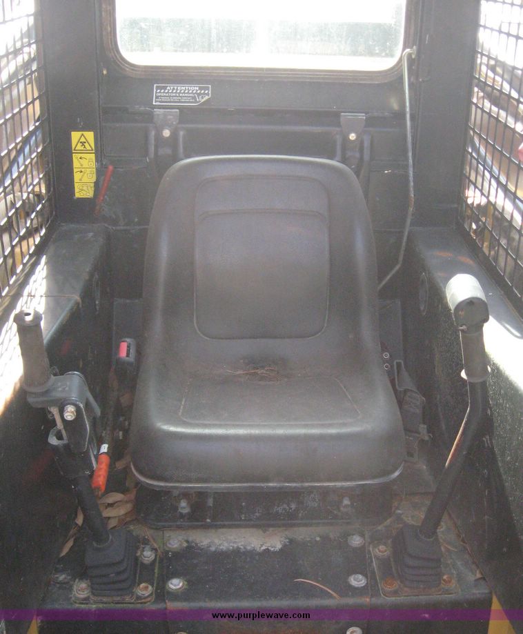 image for item 6602 1999 New Holland LX865 skid steer