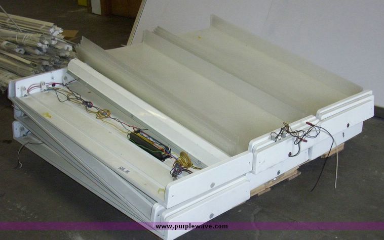 image for item 5130 (12) florescent four light fixtures