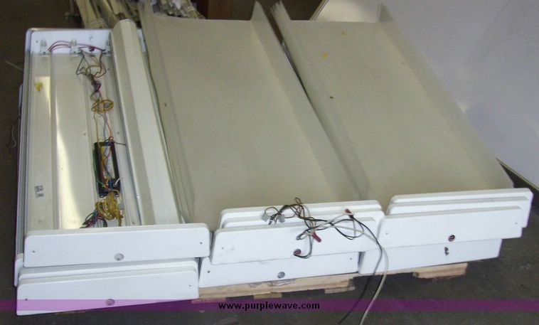 image for item 5130 (12) florescent four light fixtures
