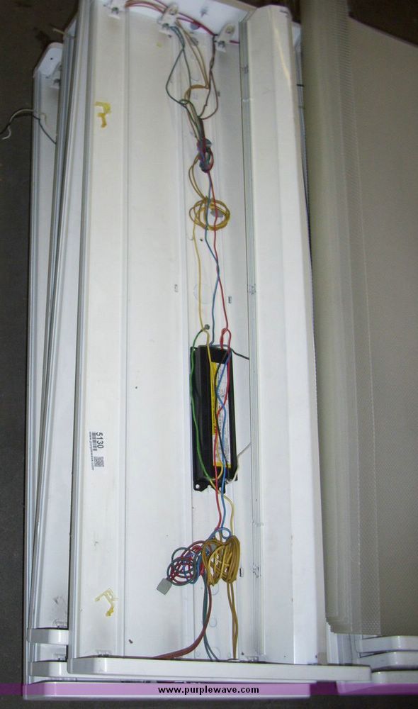 image for item 5130 (12) florescent four light fixtures