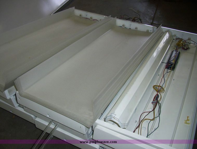 image for item 5130 (12) florescent four light fixtures