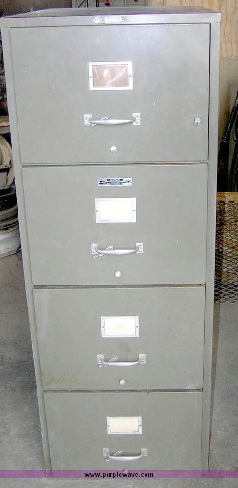 image for item 8387 (2) four drawer file cabinets