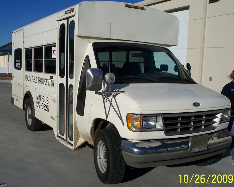 image for item 9990 1992 Ford E350 Eight passenger bus