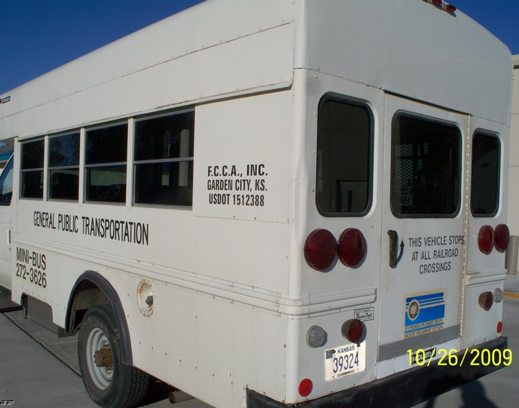 image for item 9990 1992 Ford E350 Eight passenger bus