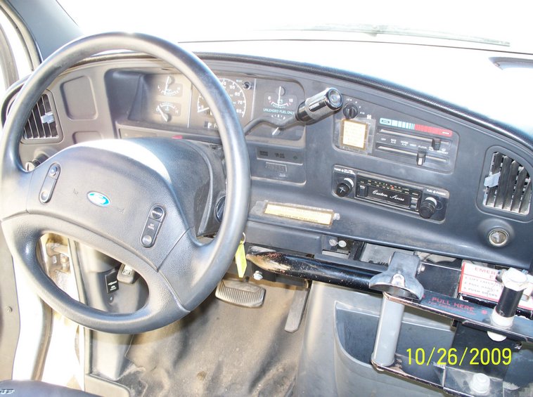 image for item 9990 1992 Ford E350 Eight passenger bus