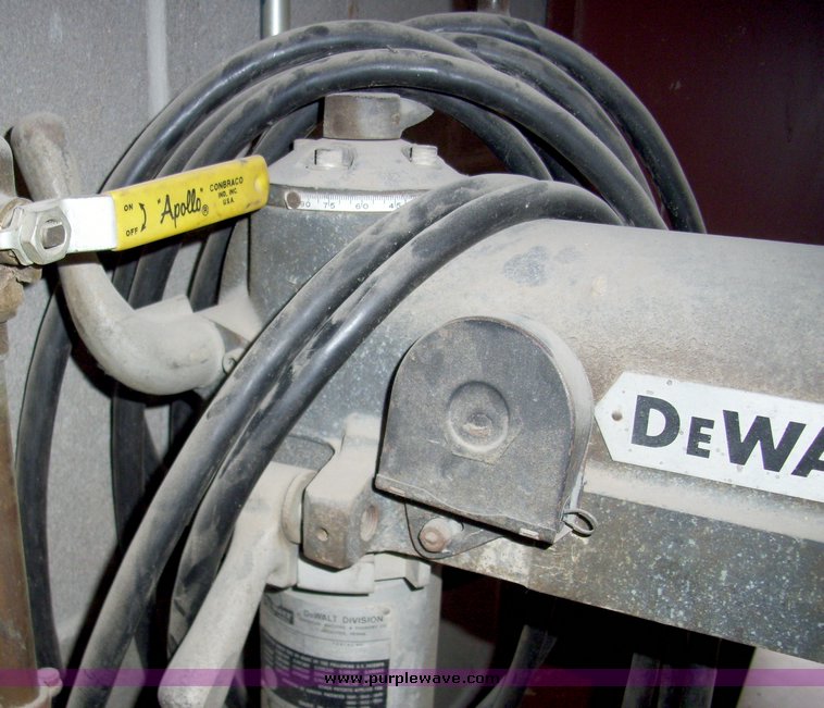 image for item 4111 Dewalt 12" compound radial arm saw
