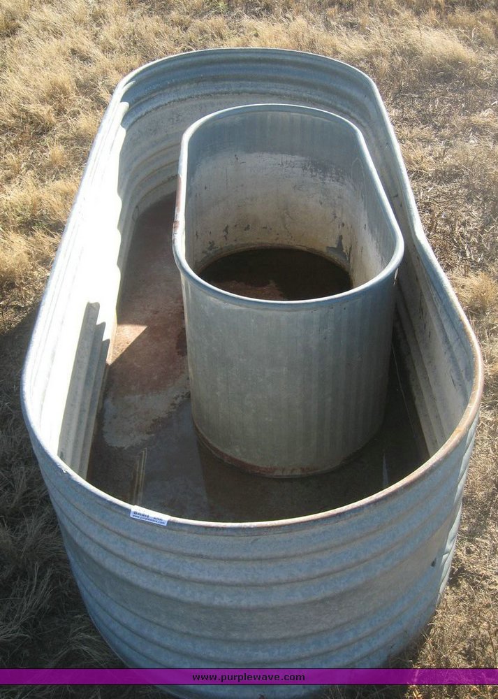 (2) oval galvanized stock tanks in Great Bend, KS Item 3645 sold Purple Wave