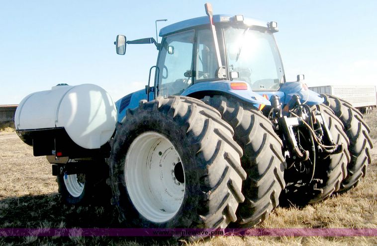 image for item 6420 2003 New Holland TG285 MFWD tractor with saddle tanks