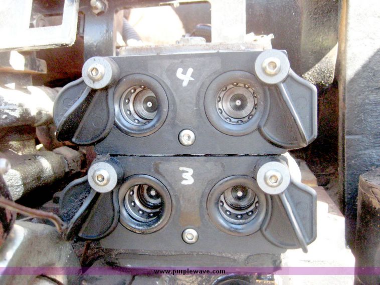 image for item 6420 2003 New Holland TG285 MFWD tractor with saddle tanks