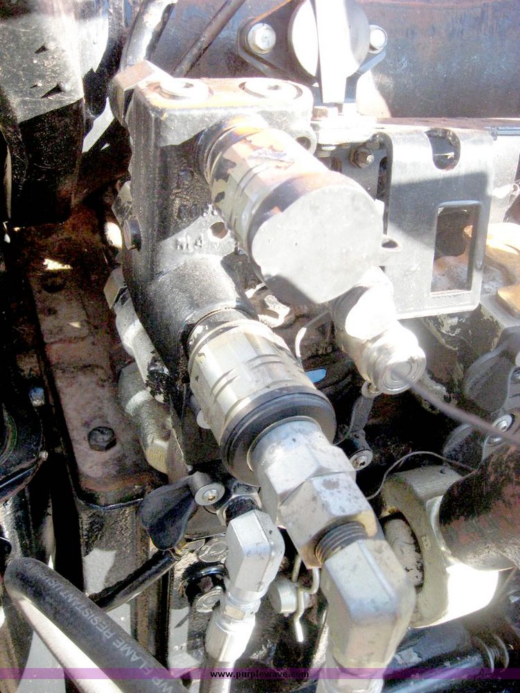 image for item 6420 2003 New Holland TG285 MFWD tractor with saddle tanks