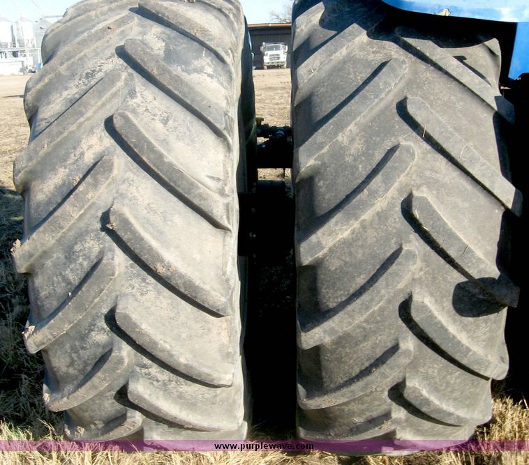 image for item 6420 2003 New Holland TG285 MFWD tractor with saddle tanks