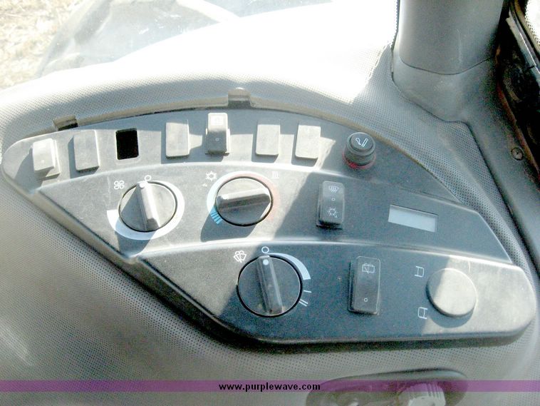 image for item 6420 2003 New Holland TG285 MFWD tractor with saddle tanks