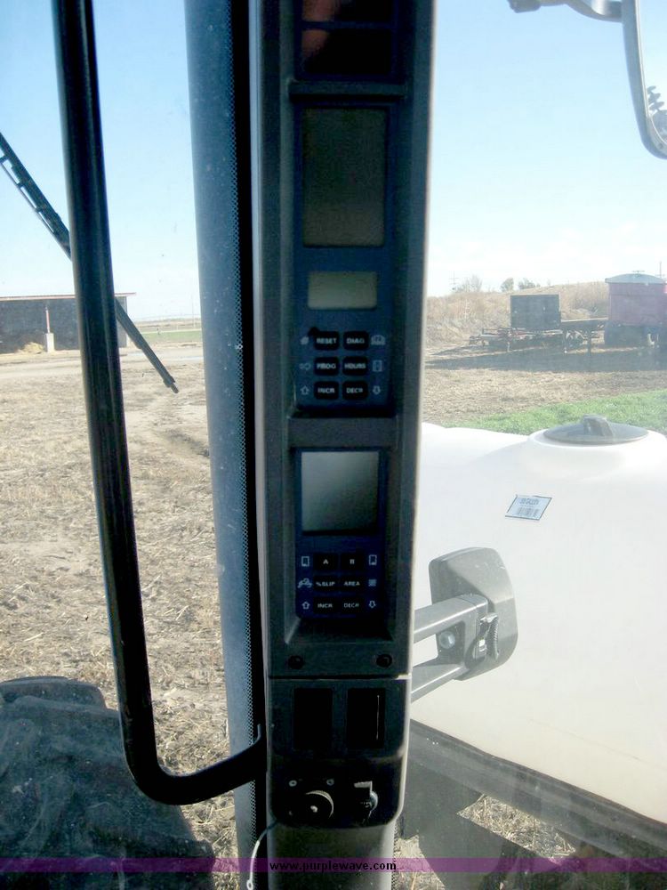 image for item 6420 2003 New Holland TG285 MFWD tractor with saddle tanks