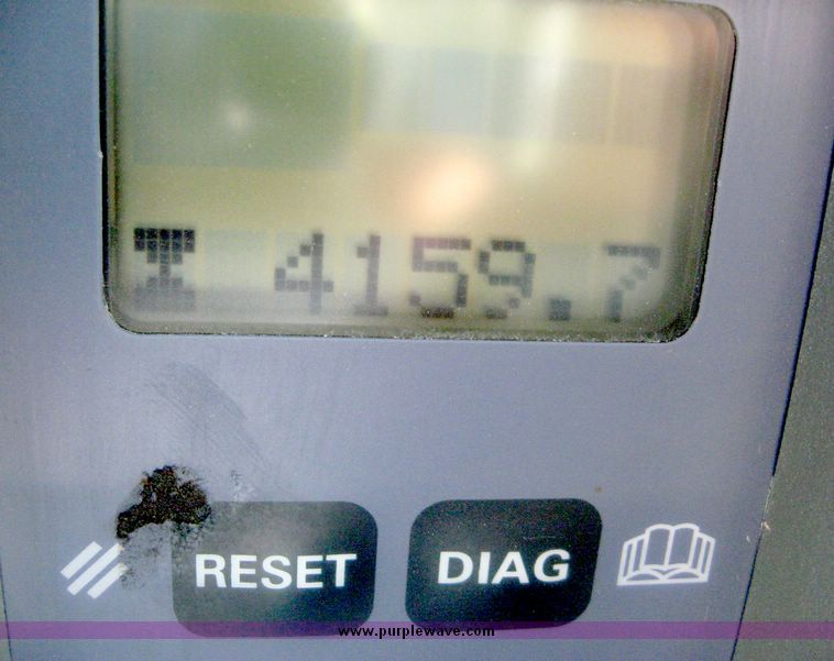 image for item 6420 2003 New Holland TG285 MFWD tractor with saddle tanks