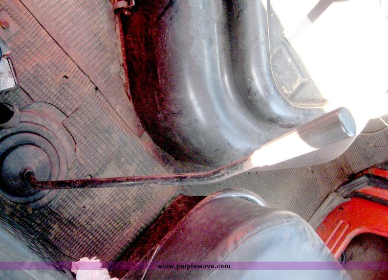 image for item 6439 1977 GMC 9500 tandem axle truck with 20' combination grain and silage bed