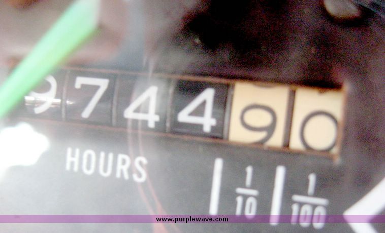 image for item 6439 1977 GMC 9500 tandem axle truck with 20' combination grain and silage bed