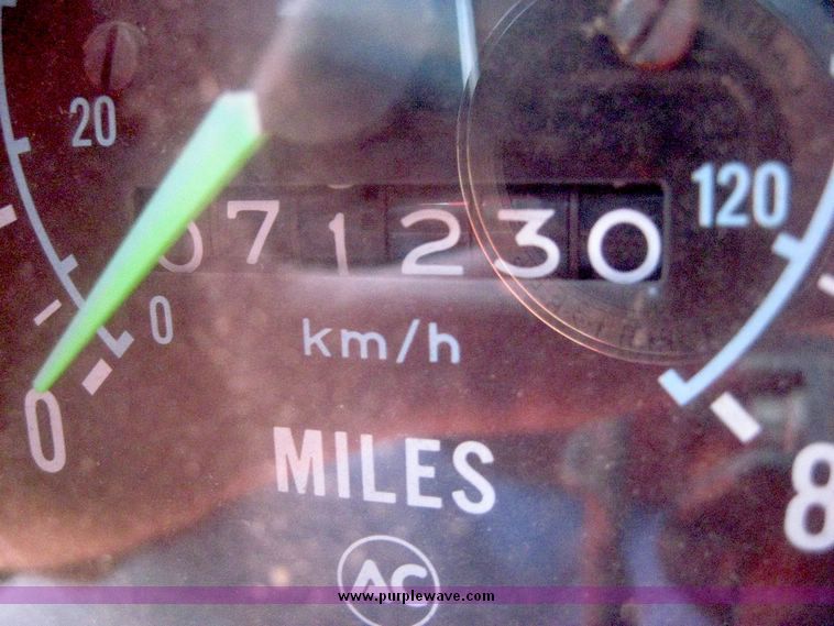 image for item 6439 1977 GMC 9500 tandem axle truck with 20' combination grain and silage bed