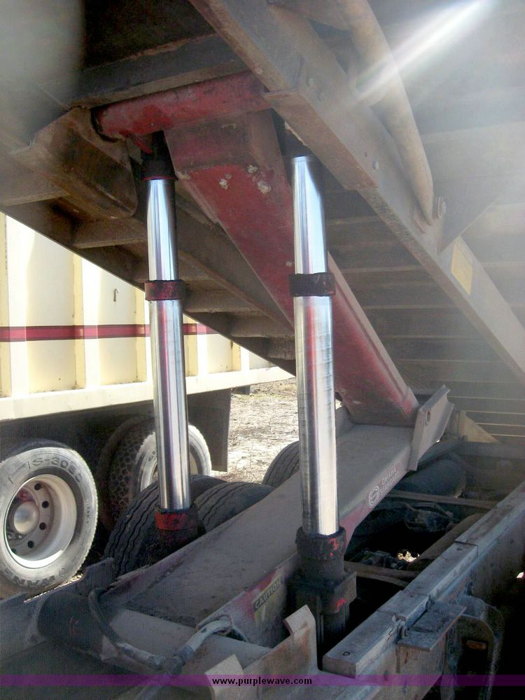 image for item 6439 1977 GMC 9500 tandem axle truck with 20' combination grain and silage bed