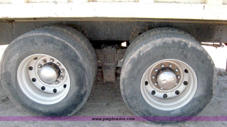 image for item 6440 1993 Ford L8000 tandem axle truck with 22' combination silage and grain bed