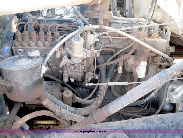 image for item 6440 1993 Ford L8000 tandem axle truck with 22' combination silage and grain bed