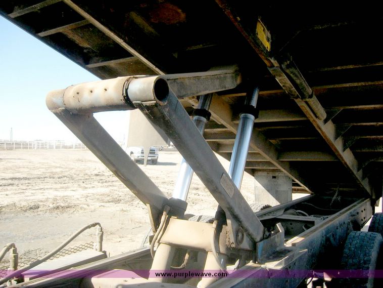 image for item 6440 1993 Ford L8000 tandem axle truck with 22' combination silage and grain bed