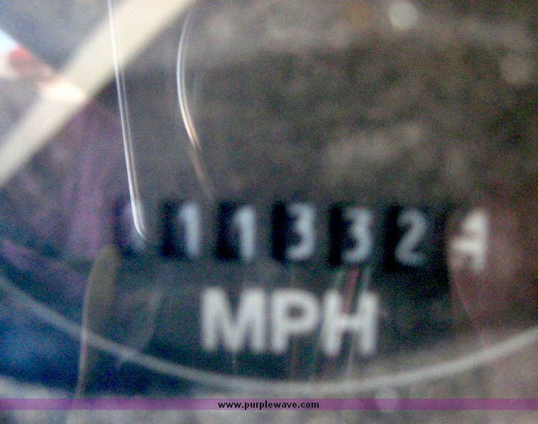 image for item 6446 1993 Ford L7000 truck with Roto-Mix 600-16 feed mixer box