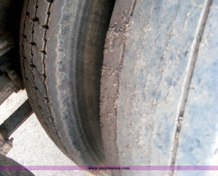 image for item 6446 1993 Ford L7000 truck with Roto-Mix 600-16 feed mixer box