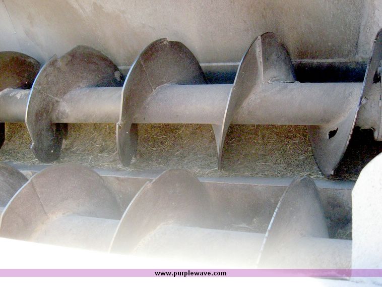 image for item 6447 1999 International 2000 SERIES 2654 tandem axle truck with Harsh 810 feed mixer box