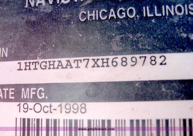 image for item 6447 1999 International 2000 SERIES 2654 tandem axle truck with Harsh 810 feed mixer box